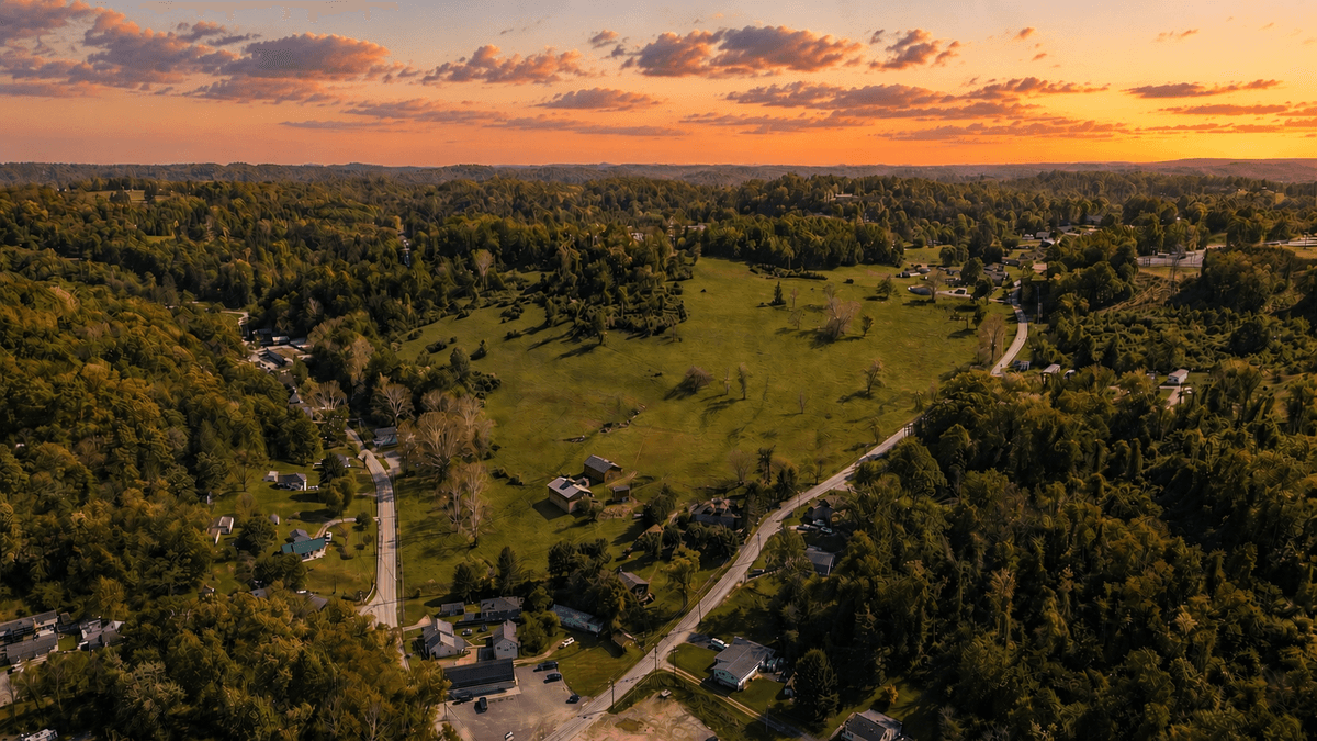 Image for SOLD $1,265,000 - Prime Fairmont Development Opportunity: Homes & Building on 38 ½ Acres with Mineral Interests