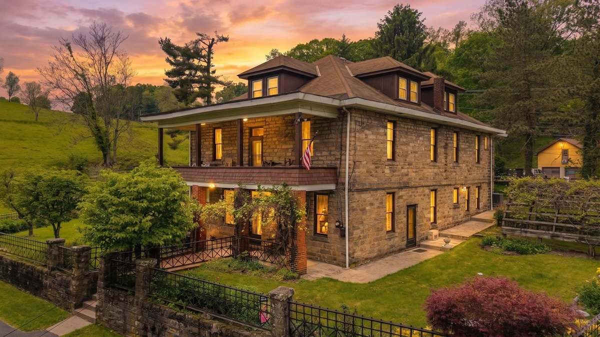 Image for SOLD $1,265,000 - Prime Fairmont Development Opportunity: Homes & Building on 38 ½ Acres with Mineral Interests