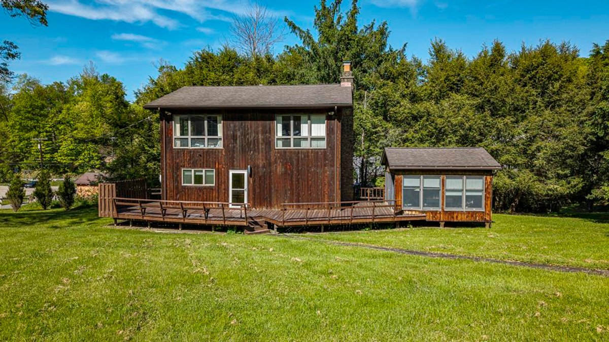 Image for SOLD $1,265,000 - Prime Fairmont Development Opportunity: Homes & Building on 38 ½ Acres with Mineral Interests