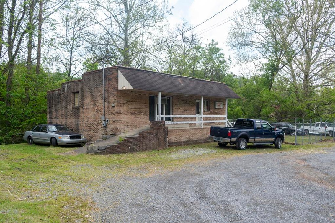 Image for SOLD $1,265,000 - Prime Fairmont Development Opportunity: Homes & Building on 38 ½ Acres with Mineral Interests