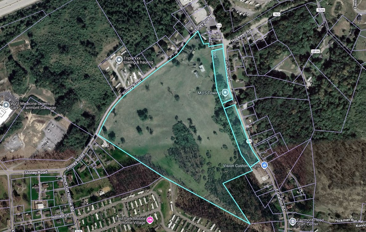Image for SOLD $1,265,000 - Prime Fairmont Development Opportunity: Homes & Building on 38 ½ Acres with Mineral Interests