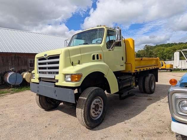 Image for Bichler Auction Services - Dennis Janz Auction - Dump Trucks, Case Dozer, Sailboat, Windmill, Farm Machinery, Cement Mixer, Vintage Snowmobiles & More - Adell, WI