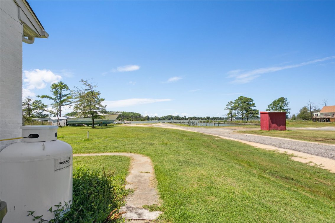 Image for Income Producing Waterfront Estate Mathews VA - Potential Annual Income $138,500 - Ranch Home - Guest Cottage -  Boat Ramp and 15 Slips - Fronting Billups Creek; 967 Lillys Neck Rd