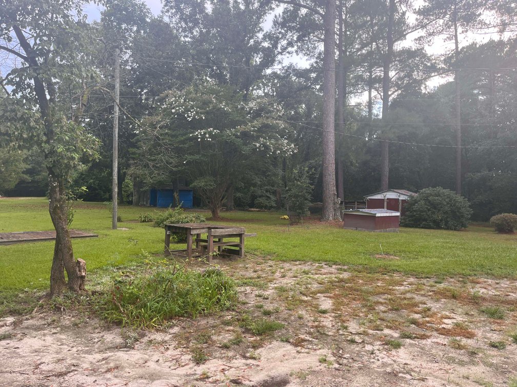 Image for 43 acres in Harnett County with a brick home in an onsite live /online / simulcast auction event!