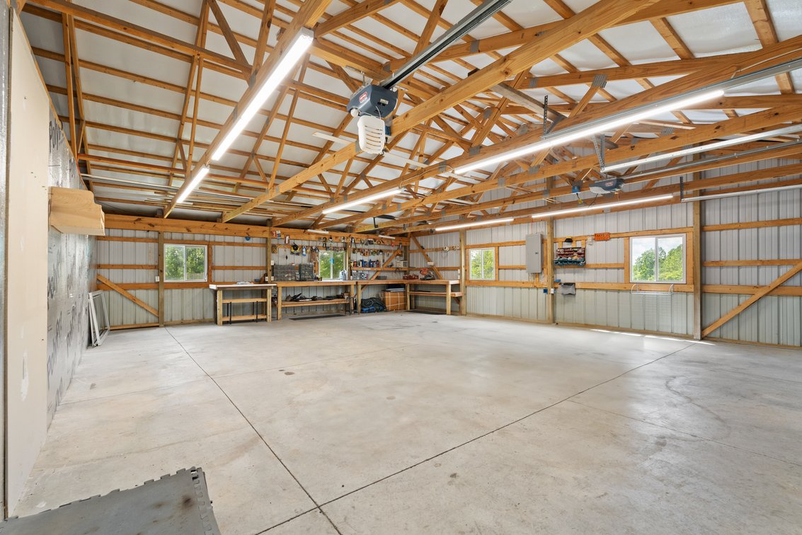 Image for Harrison County Real Estate Auction,  Cape Cod on 9.87 Acres, Inground Pool, Koi Pond & Finished Walkout - ONLINE AUCTION ONLY