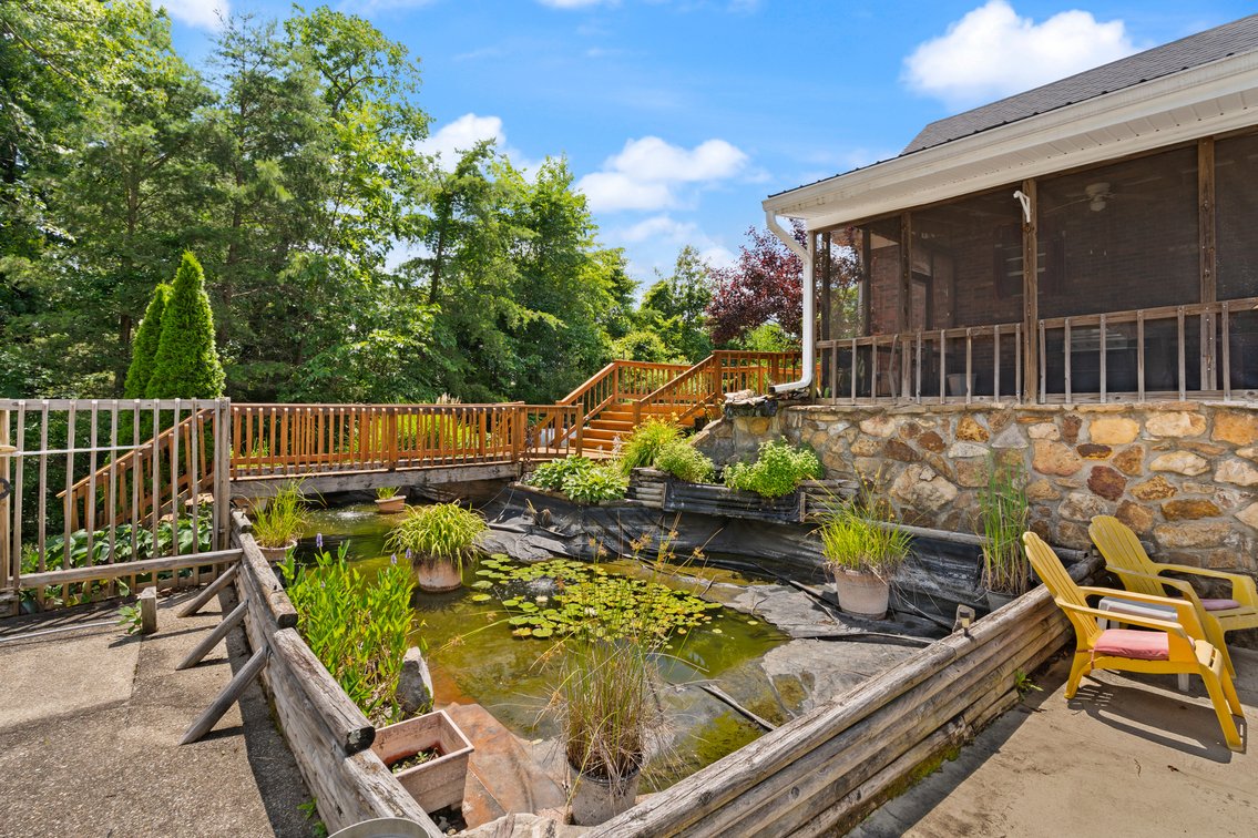 Image for Harrison County Real Estate Auction,  Cape Cod on 9.87 Acres, Inground Pool, Koi Pond & Finished Walkout - ONLINE AUCTION ONLY