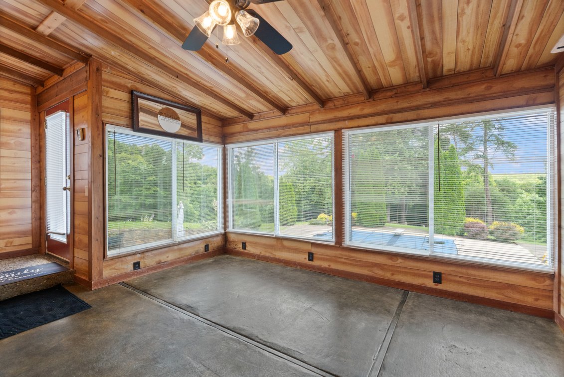 Image for Harrison County Real Estate Auction,  Cape Cod on 9.87 Acres, Inground Pool, Koi Pond & Finished Walkout - ONLINE AUCTION ONLY