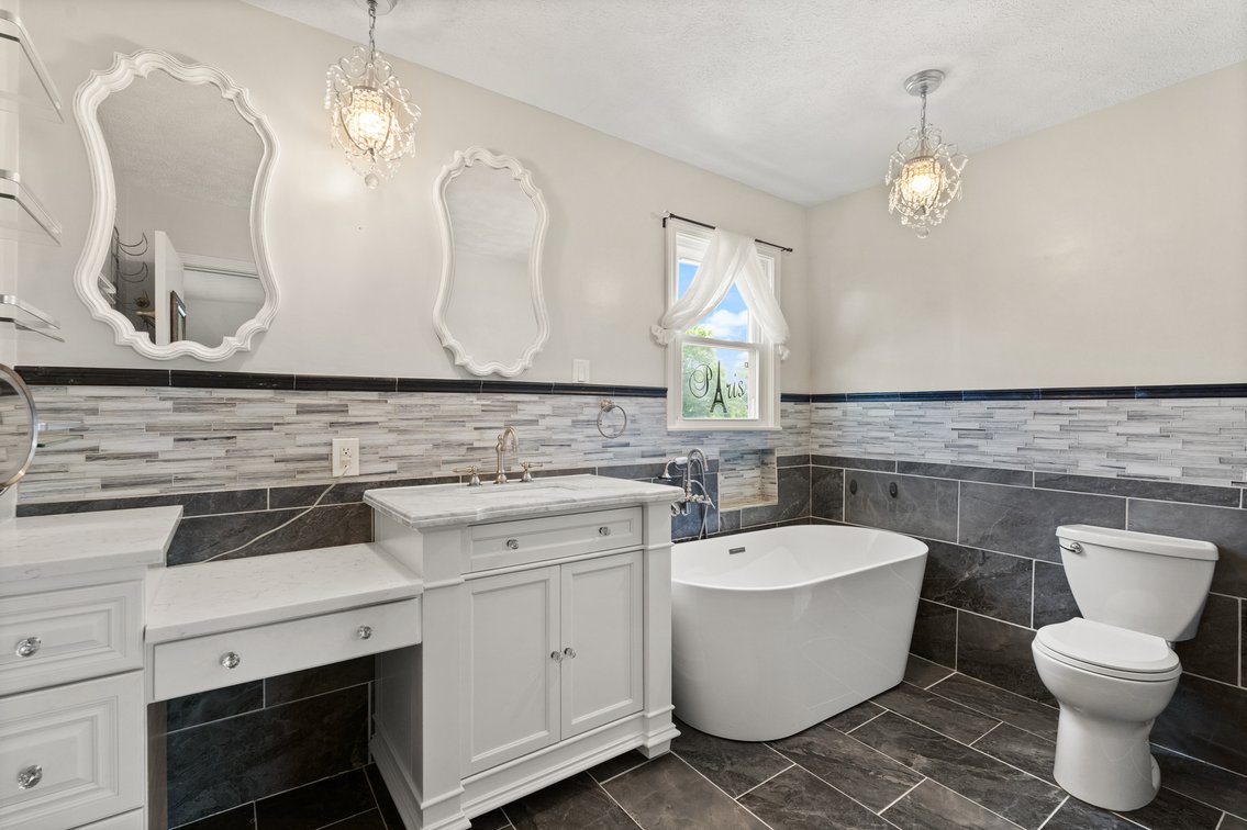 Image for Harrison County Real Estate Auction,  Cape Cod on 9.87 Acres, Inground Pool, Koi Pond & Finished Walkout - ONLINE AUCTION ONLY
