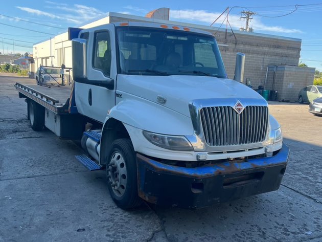 Image for 2020 & 2019 International Flatbed Tow Trucks & 2005 Colorado Plow Truck