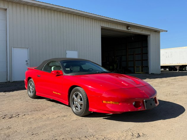 Image for 1997 Pontiac Firebird Trans Am & 2020 Ram 3500 Box Truck