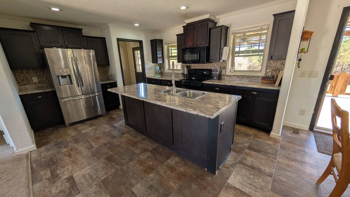 Image for ONLINE AUCTION!  2015 DOUBLEWIDE 4 BR, 2 BA HOME & 66.45 ACRES+/- IN 7 TRACTS NEAR HAMILTON, AL