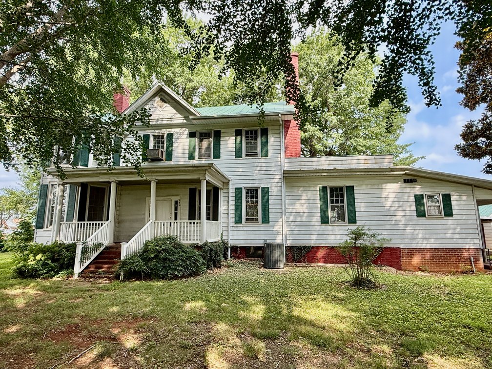 Image for 4 BR/2.5 BA Multi-Tenant Home and Large Detached Shop/Garage on 1.619 +/- Acres in Downtown Madison, VA--ONLINE ONLY BIDDING!!