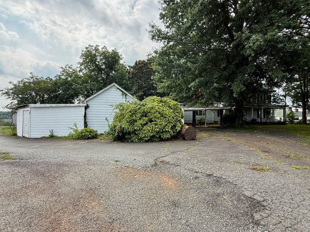 Image for 4 BR/2.5 BA Multi-Tenant Home and Large Detached Shop/Garage on 1.619 +/- Acres in Downtown Madison, VA--ONLINE ONLY BIDDING!!