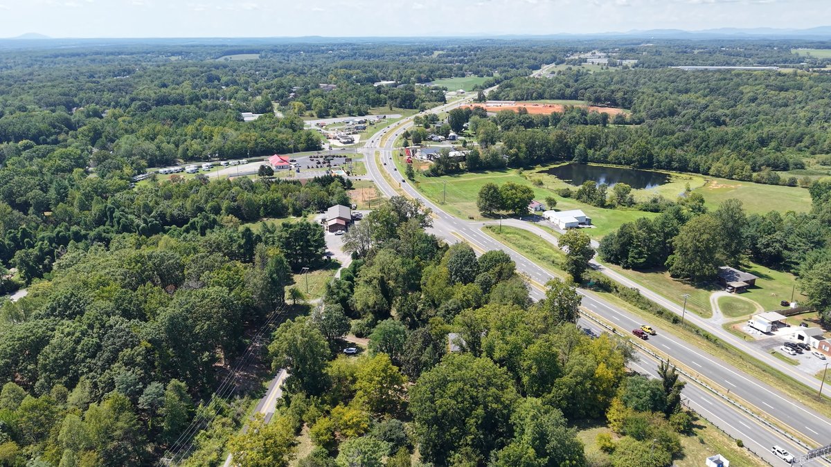 Image for Valuable 3.12 +/- Acre Corner Parcel w/4 BR Brick Home, Frontage on Rt. 460 & Sunburst Rd. Southeast of Lynchburg, VA--Campbell County