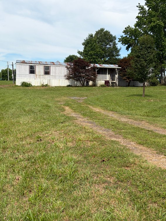 Image for ONLINE AUCTION ONLY!  3 bed 2 bath 16x76 mobile home on 1.39 un-restricted acres - beautiful lot!