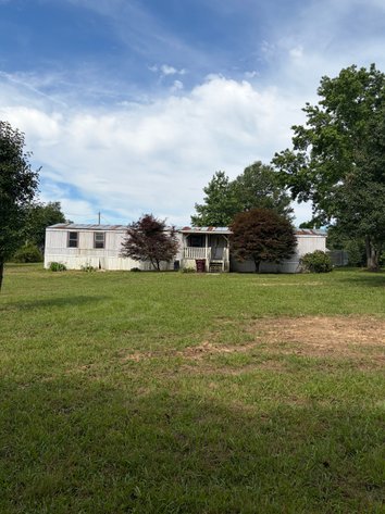 ONLINE AUCTION ONLY!  3 bed 2 bath 16x76 mobile home on 1.39 un-restricted acres - beautiful lot!