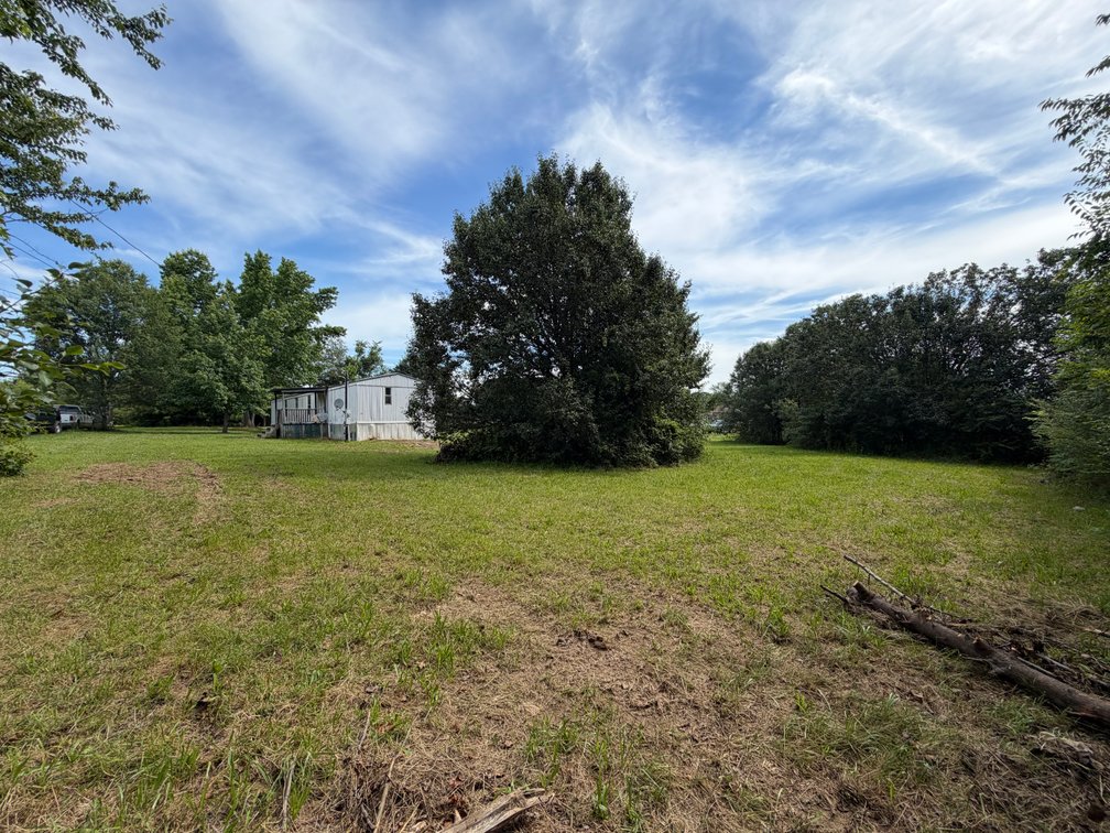 Image for ONLINE AUCTION ONLY!  3 bed 2 bath 16x76 mobile home on 1.39 un-restricted acres - beautiful lot!