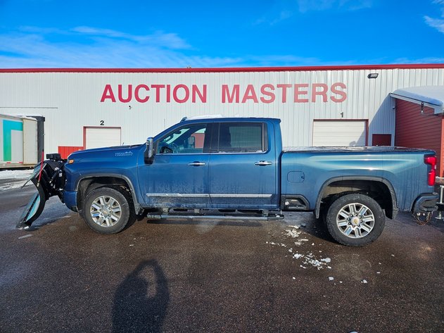 Image for 2024 Chevy Silverado with Plow, 2023 Trailer and Hustler Mower