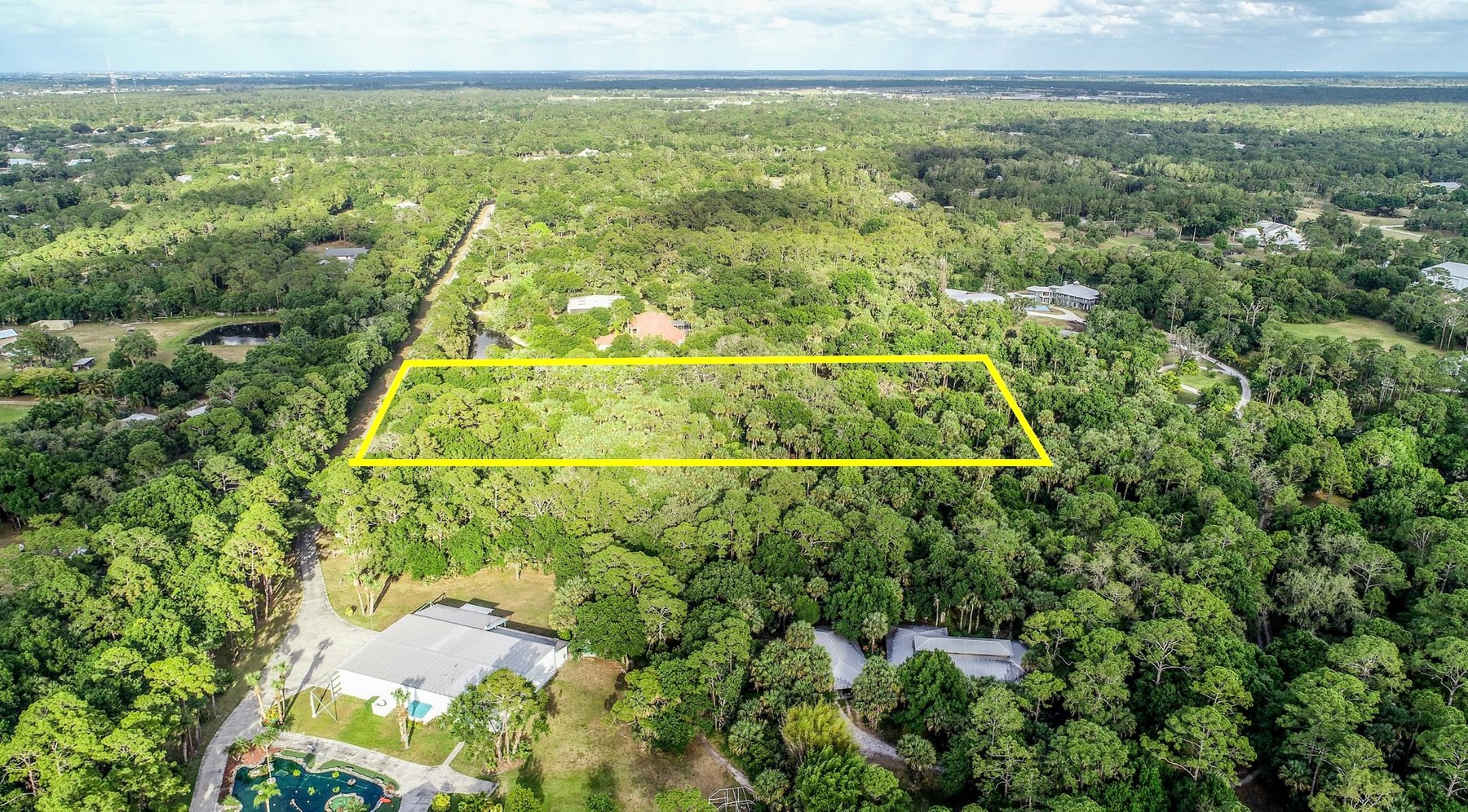 Image for For Sale ONLY at AUCTION 4.6 Acre Estate Lot in Fly-In Community