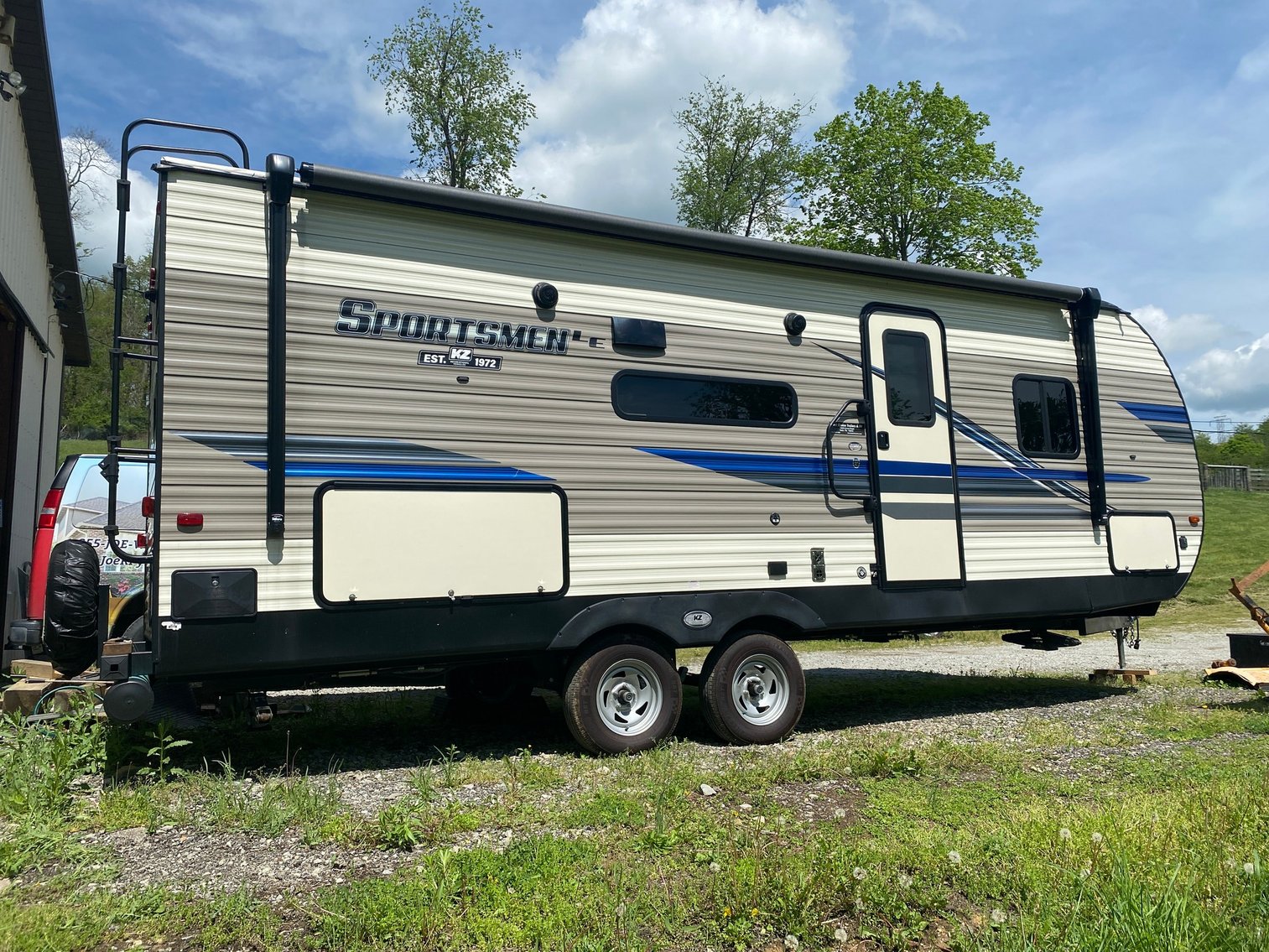 Image for West Alexander, PA – Estate of Michael J. Smith: Like new '21 Sportsmen Camper, '11 Chevy HHR, New Holland Skid Steer, Trailers, Tools, and MUCH MORE