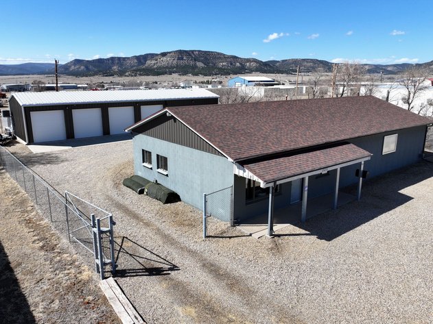 Image for Commercial Property with 24x80 Shop with 4 Bays, Auto Lift & Loft, 32x63 Shop with 2 Bays & 2 Bathrooms - Raton, NM