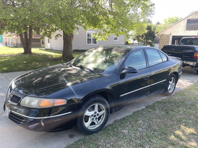 Image for Swenson Estate - 1999 Chevy Silverado Truck, 2000 Pontiac Bonneville, Kawasaki Four Wheeler, Boat & Trailer - Buffalo City, WI