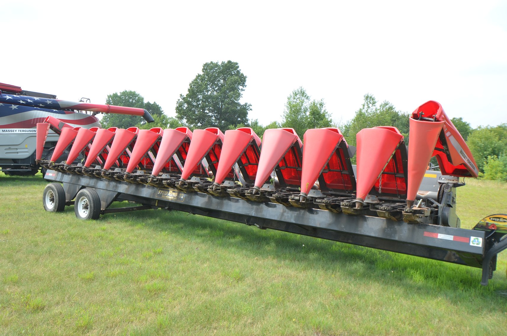 Image for LOFTNESS GRAIN BAG LOADER/UNLOADER, MF 9540 COMBINE, MF CORN HEAD, IH 7300 FLATBED TRUCK