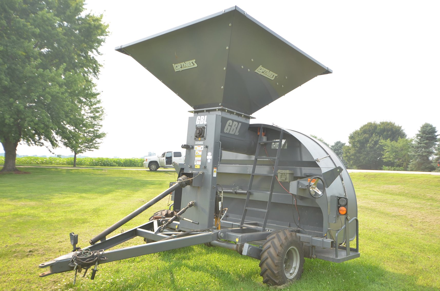 Image for LOFTNESS GRAIN BAG LOADER/UNLOADER, MF 9540 COMBINE, MF CORN HEAD, IH 7300 FLATBED TRUCK