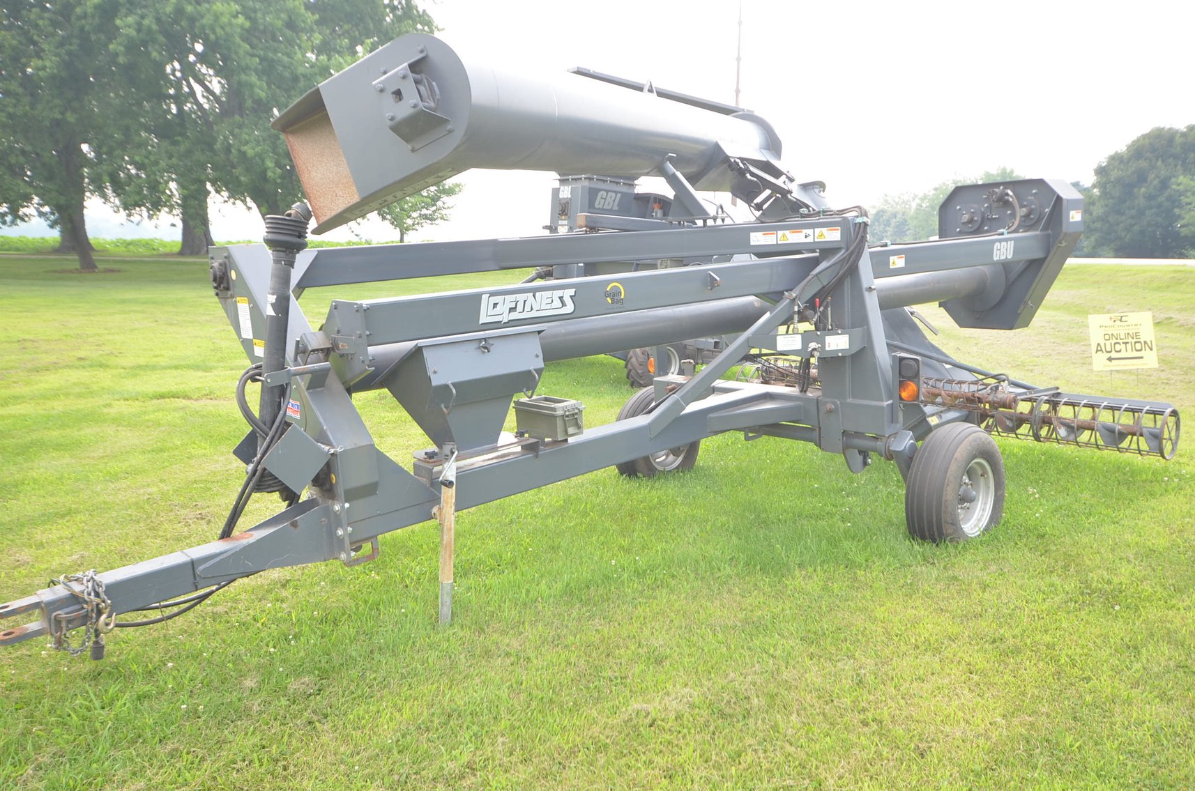 Image for LOFTNESS GRAIN BAG LOADER/UNLOADER, MF 9540 COMBINE, MF CORN HEAD, IH 7300 FLATBED TRUCK