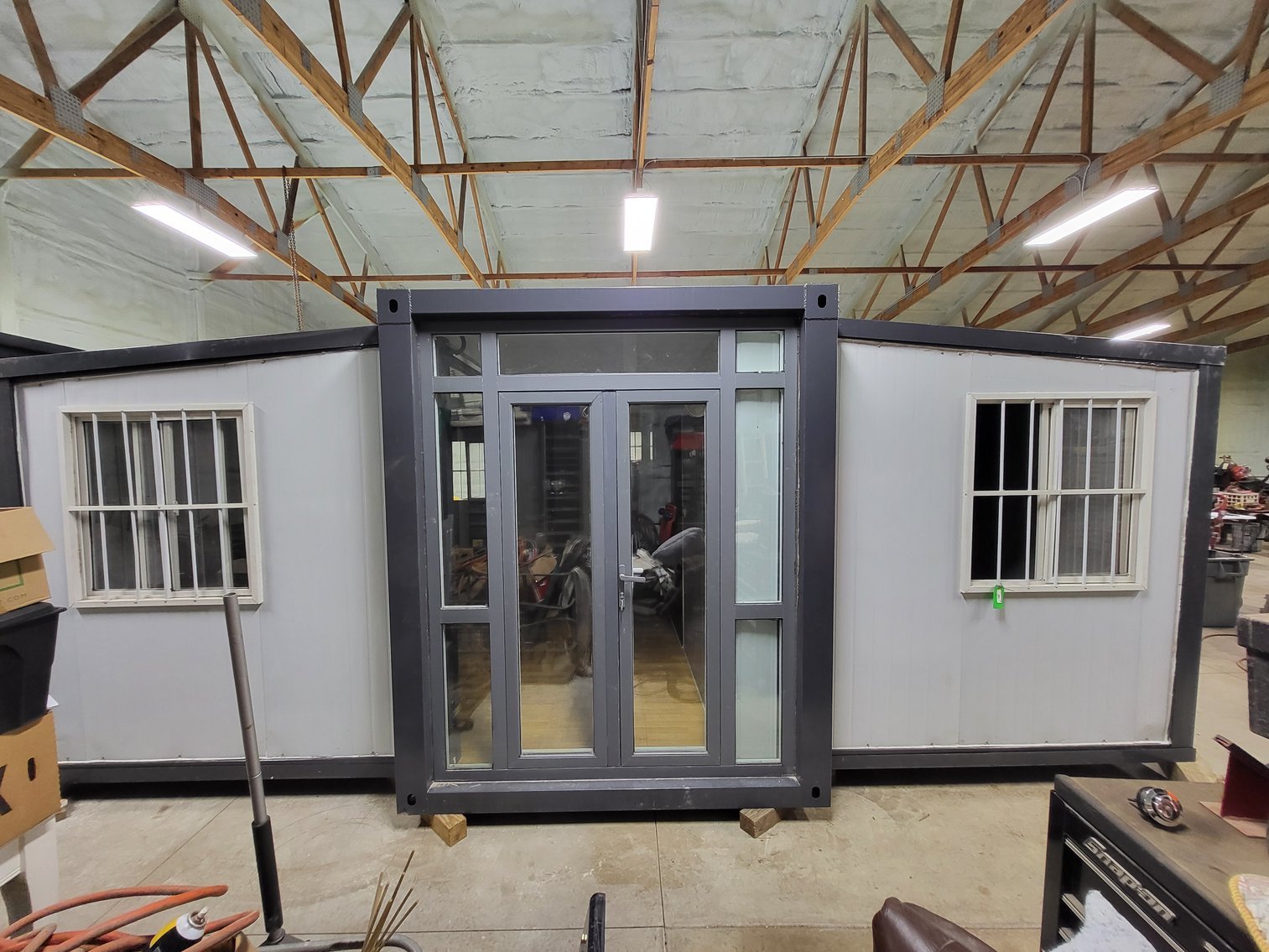 Image for Container House, Commercial Mower, and Restroom