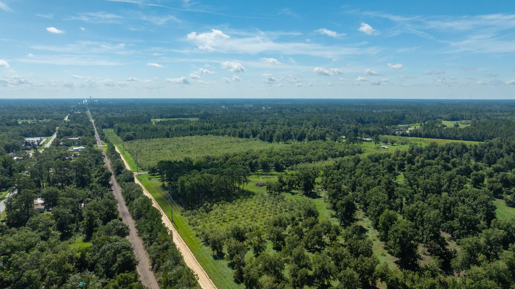 Image for 235± Acres – Woodard Orchard - Irrigated Pecan Orchard with Pond,  Homes, Buildings & Improvements - Prime Development Potential