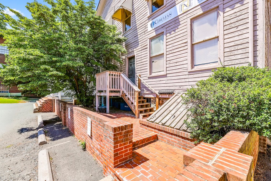 Image for Rare Downtown Leesburg, VA Opportunity! 3 Attached Buildings with 13 Parking Spaces on E. Market St. Across from the Historic Courthouse — Selling as a Single Offering!!