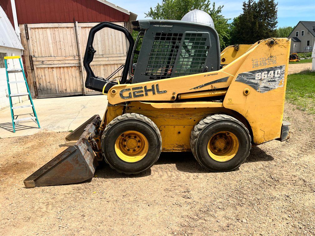 Vehicles, Equipment & Toy Hauler Auction: F-350, Roll Back, Dump Truck, Gehl Skid Steer & More