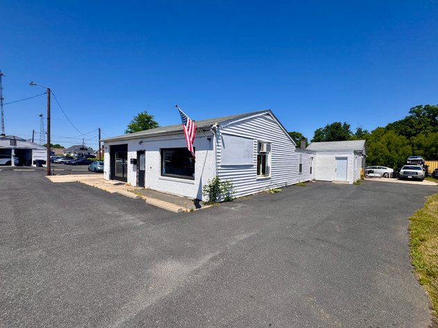 Image for Income Producing Commercial Building w/Office, Apartment & 2 Bay Garage/Shop on .46 +/- Acres w/Rts. 1 & 208 Visibility--ONLINE ONLY BIDDING!!