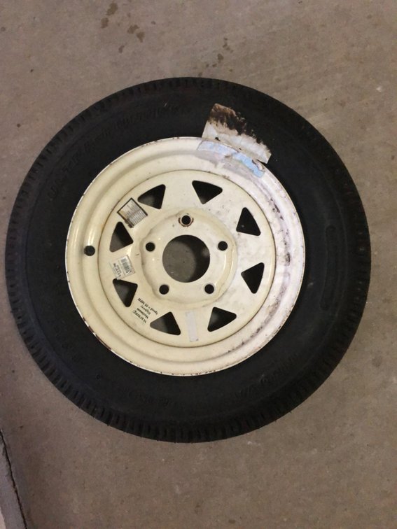 New 12” spare tire w/rim