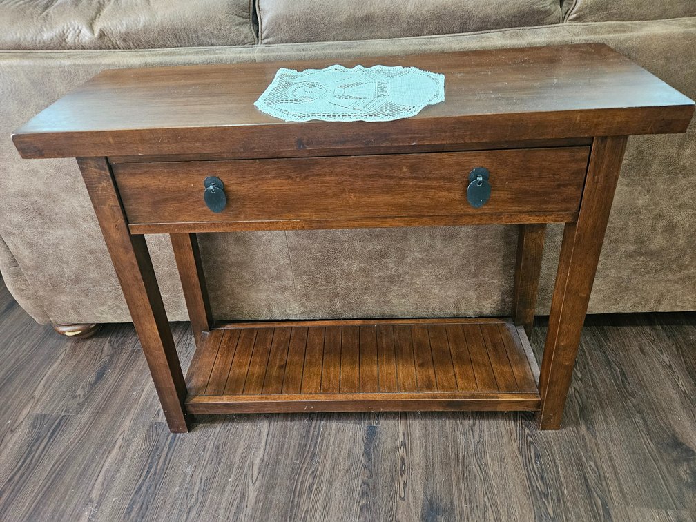 Wood Console Table And Lace Doily