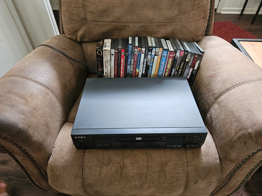 Apex AD-500W DVD Player And Assorted DVD Collection
