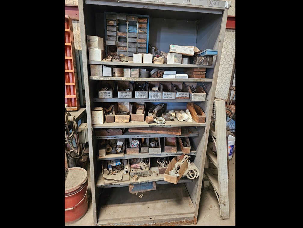 Metal shelf including contents 