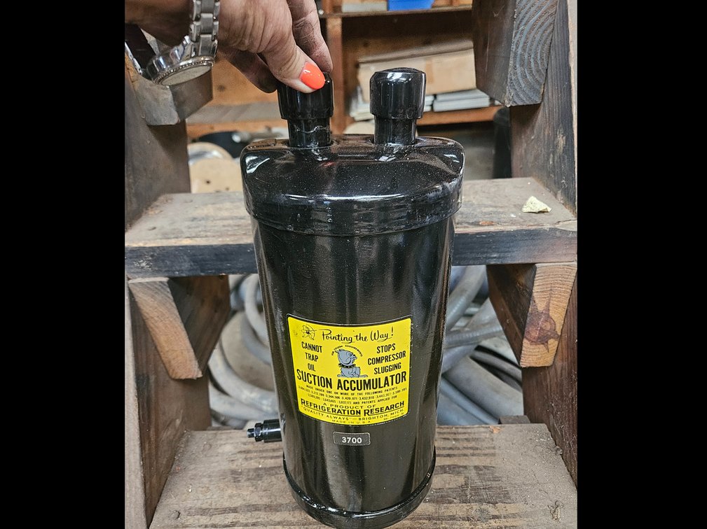 Suction accumulator