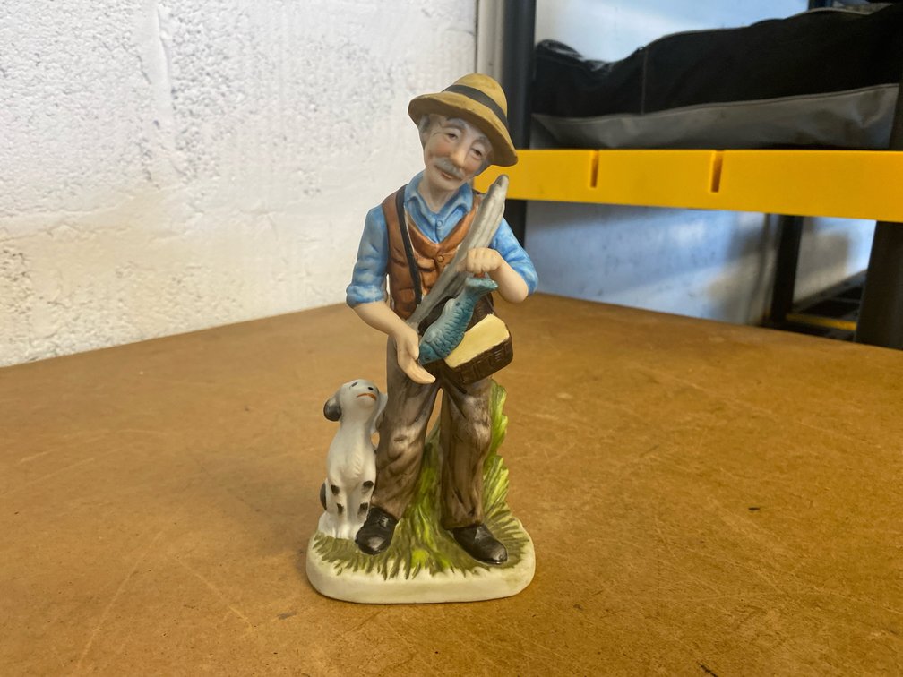 Porcelain Elderly Fisherman Figurine
