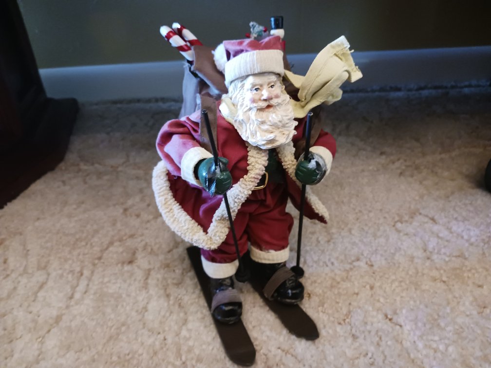 Skiing Santa Figurine