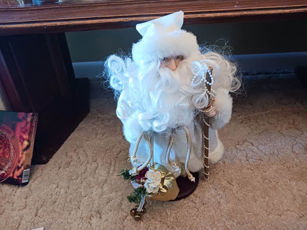 Santa in White Figurine