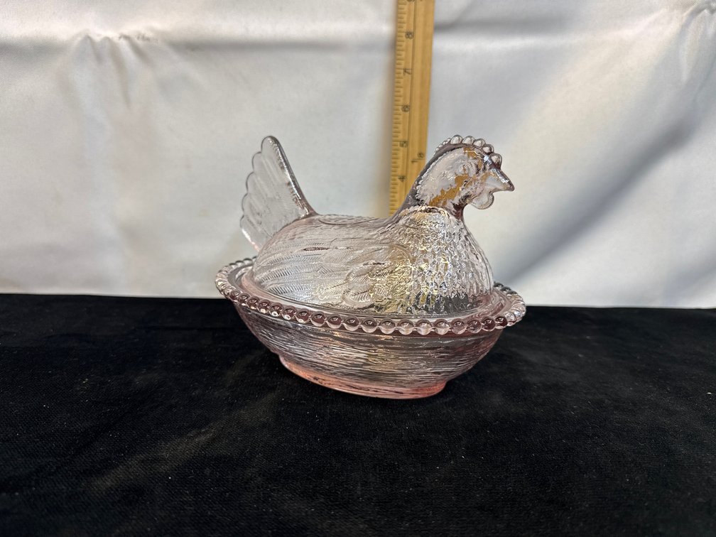 Pink Hen on a Nest