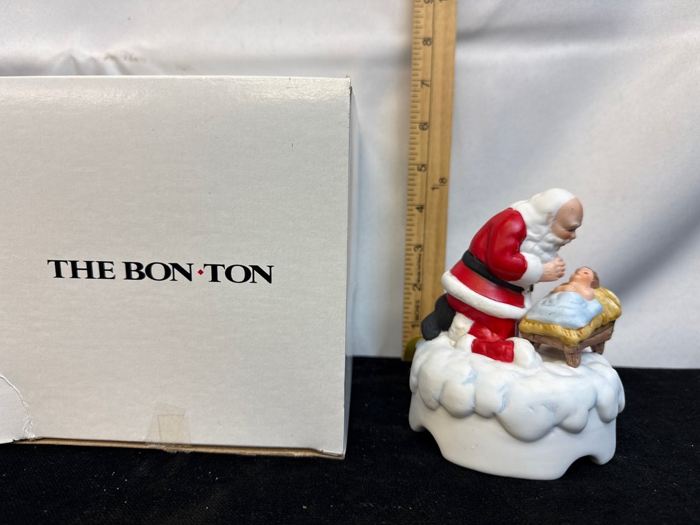 Kneeling Santa Musical Figurine
