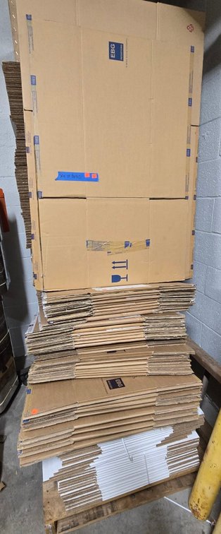 Skid of Flattened Cardboard Boxes-Well Rm
