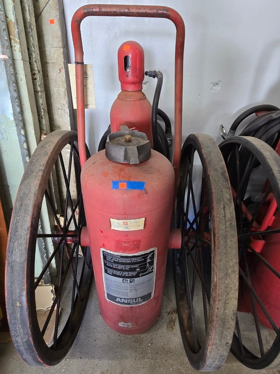 Antique Ansul Wheeled Fire Extinguishers-Garage