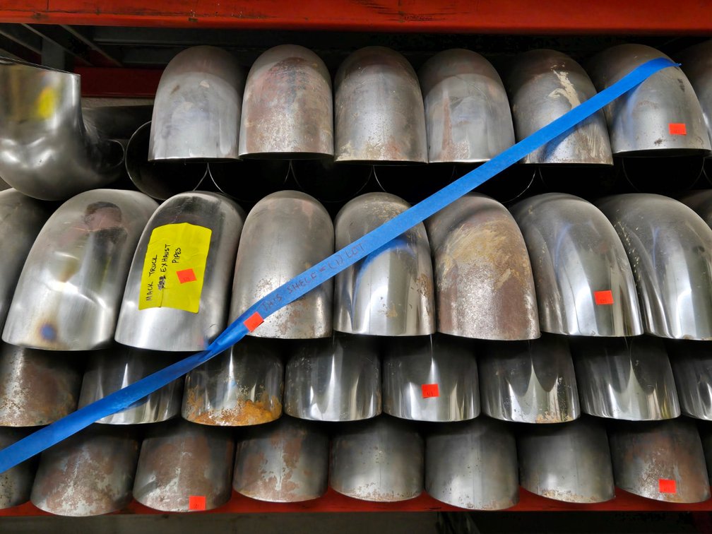 (1) Shelf of Mack Truck Exhaust Pipes-Central Room
