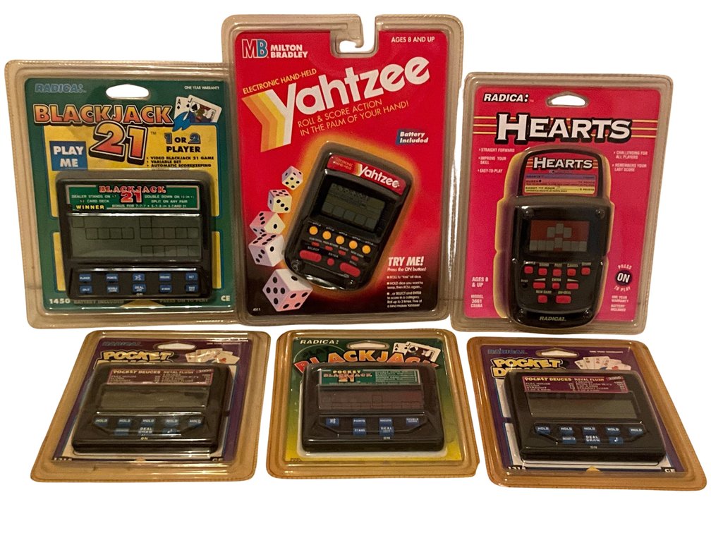 Radica and Milton Bradley Handheld Electronic Games Including Yahtzee, Hearts, and Blackjack