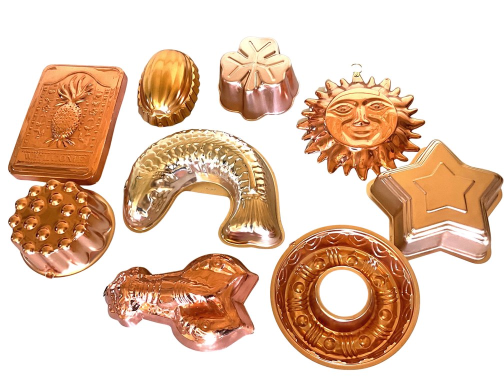 Nine Copper Tone Molds
