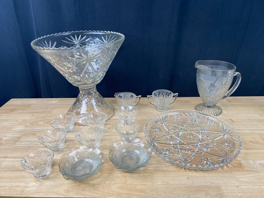 Collection of Starburst Pattered Glass Pitcher, Serving Tray, Cream and Sugar Dishes, (4) Desert Bowls, Large Punch Bowl with cups